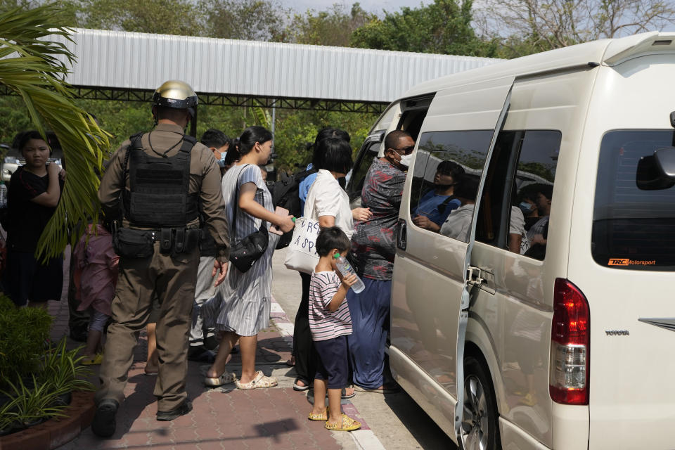 Members of the Shenzhen Holy Reformed Church, also known as the Mayflower Church, leave from the Nongprue police station on their way to Pattaya Provincial Court in Pattaya, Thailand, Friday, March 31, 2023. More than 60 members of a Chinese Christian church have been detained in Thailand, supporters said Friday, raising fears they may be returned to their home country, where they face possible persecution. (AP Photo/Sakchai Lalit)