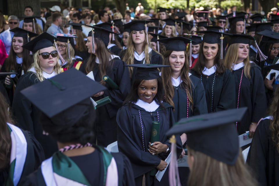 SWEET BRIAR, VA - MAY 16: Graduates congratulate each other during the final commencement ceremony at Sweet Briar College, a women's liberal arts college in Sweet Briar, Virginia, on Saturday, May 16, 2015. The school is closing its doors this summer due to a lack of funding.  (Photo by Jabin Botsford/The Washington Post via Getty Images)
