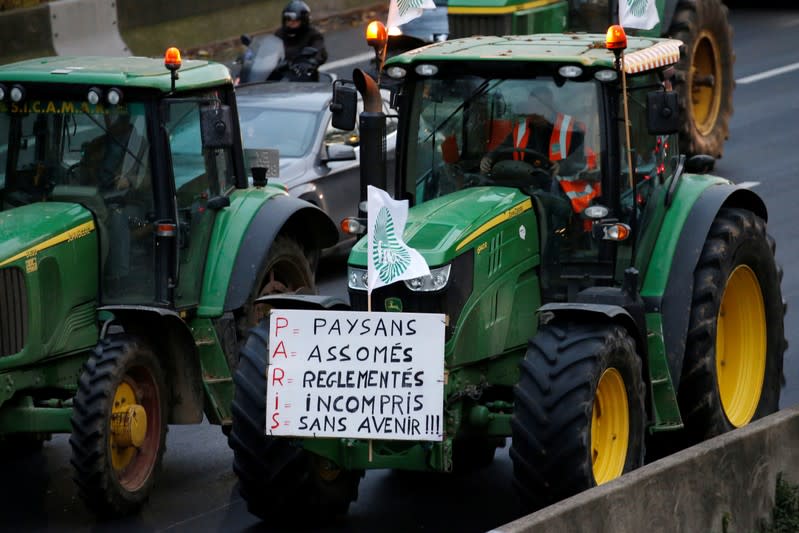 French farmers drive on the A1 Lille-Paris motorway during a protest towards Paris