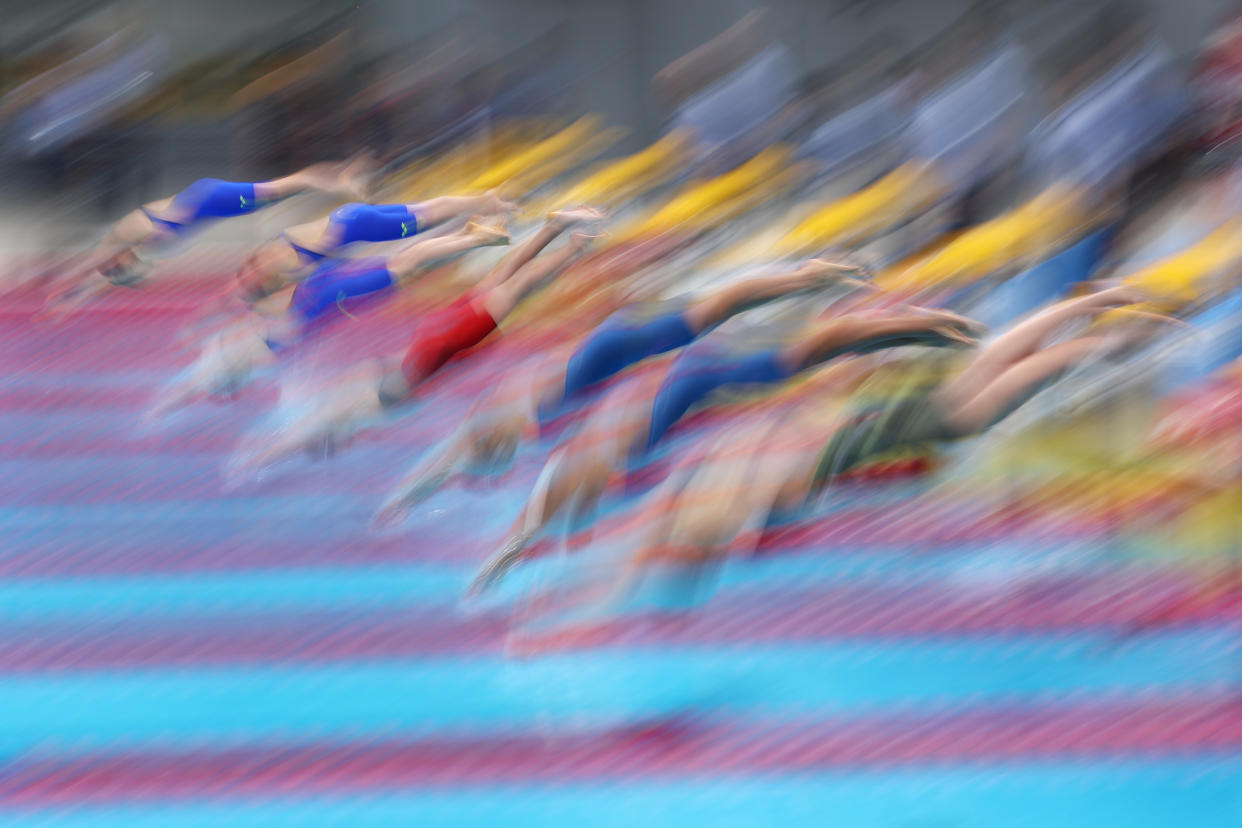 TOKYO, JAPAN - MARCH 20: A general view of swimmers competing in the Women's 100m Freestyle Heat during day four of the Swimming Olympic Qualifier at Tokyo Aquatics Centre on March 20, 2024 in Tokyo, Japan. (Photo by Kiyoshi Ota/Getty Images)