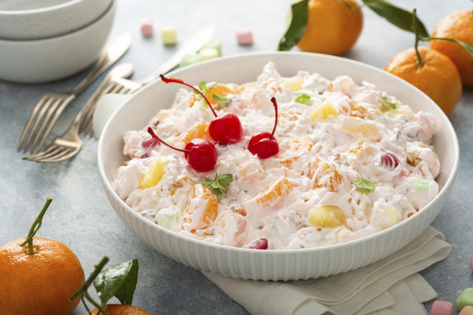 This December 2020 photo shows a recipe for Ambrosia salad for the food blog My Baking Addiction in Suwanee, Ga. The fluffy fruit concoction has a history dating back more than 100 years. (Elena Vaselova for My Baking Addiction via AP).