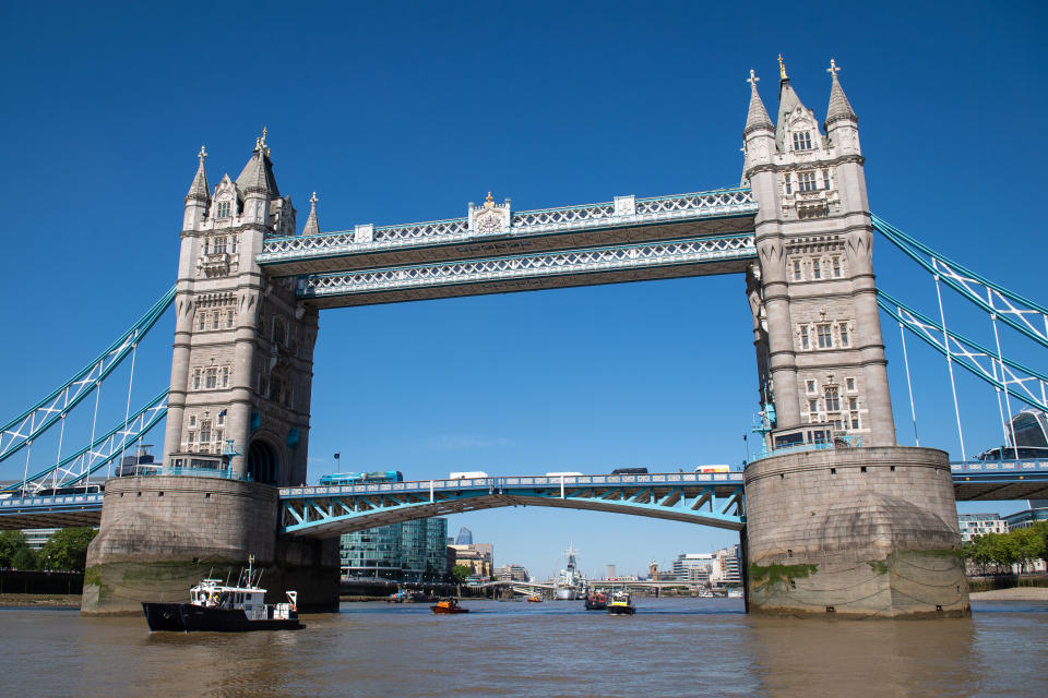 LONDON, ENGLAND - MAY 21: Boats operated by the Port of London Authority, Royal National Lifeboat Institution, Metropolitan Police and London Fire Brigade pass under Tower Bridge during the launch of a new campaign to help prevent accidents and self-harm incidents on the River Thames on May 21, 2019 in London, England. (Photo by Dominic Lipinski - WPA Pool/Getty Images)