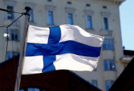 FILE PHOTO: Finland's flag flutters in Helsinki, Finland, May 3, 2017. REUTERS/Ints Kalnins/File Photo