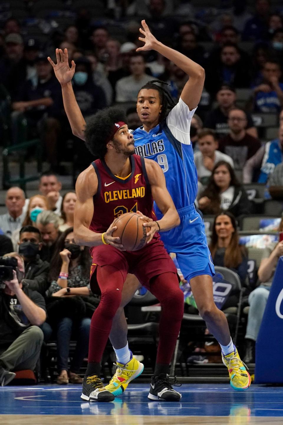 Cavaliers center Jarrett Allen (31) works against Dallas Mavericks center Moses Brown, rear, for a shot opportunity in the first half of the Cavs' 114-96 win Monday night in Dallas. [Tony Gutierrez/Associated Press]