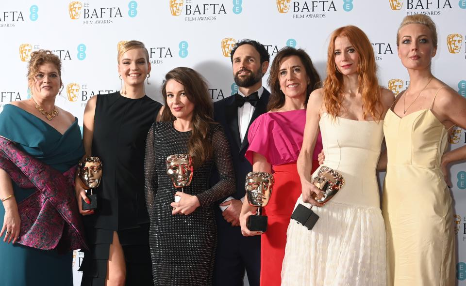 LONDON, ENGLAND - FEBRUARY 19: Melanie Miller, Shane Boris, Diane Becker and Odessa Rae pose with the Documentary Award for 'Navalny' during the EE BAFTA Film Awards 2023 at The Royal Festival Hall on February 19, 2023 in London, England. (Photo by Dave J Hogan/Getty Images)