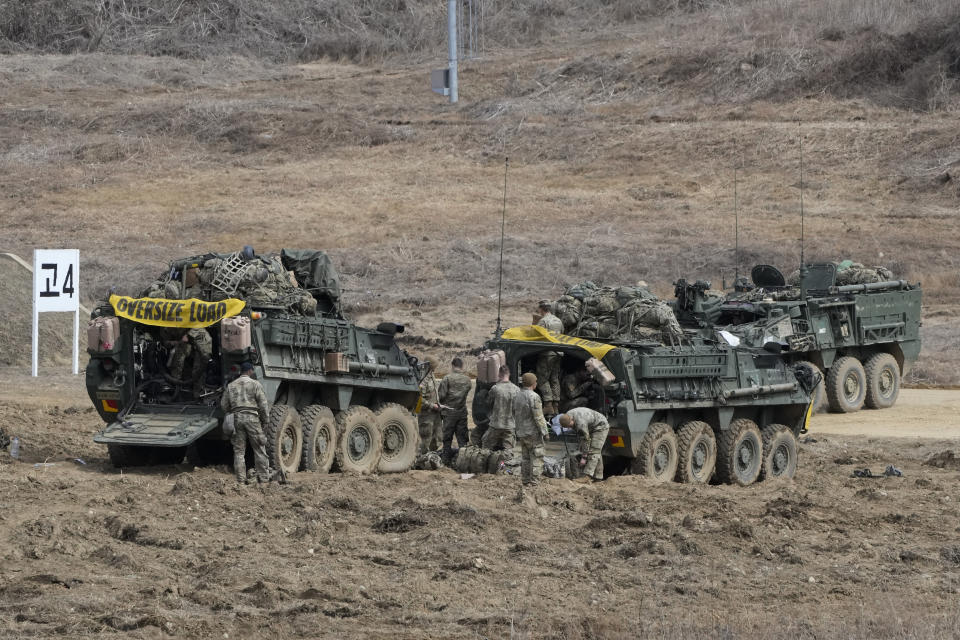 U.S. Army soldiers prepare for their exercise at a training field in Paju, South Korea, near the border with North Korea, Friday, March 17, 2023. North Korea said Friday it fired an intercontinental ballistic missile to "strike fear into the enemies" as South Korea and Japan agreed at a summit to work closely on regional security with the United States and staged military exercises around the region.(AP Photo/Ahn Young-joon)