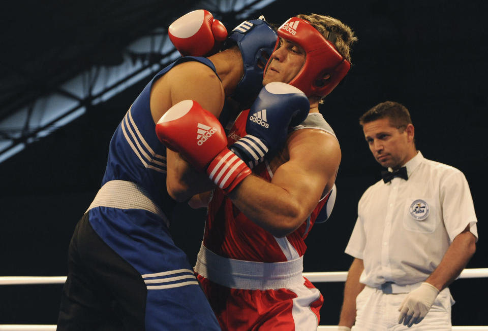 AVEZZANO, ITALY - JULY 02: Clemente Russo of Italy (R) fights Mourad Sahraoui of Turkey (B) during the Men's Heavy 91kg final on day 6 during the XVI Mediterranean Games at the Sports Hall Pala Ghiaccio on July 2, 2009 in Avezzano, Italy. (Photo by Getty Images/Getty Images)
