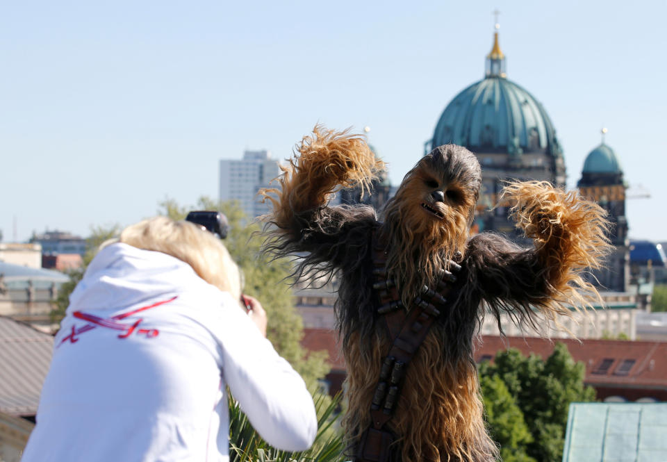 A person dressed up as Chewbacca character poses during a photocall to promote the new Star Wars Movie “Solo: A Star Wars Story” in Berlin, Germany, May 4, 2018. REUTERS/Axel Schmidt