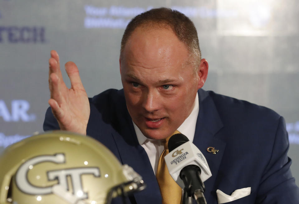 Newly hired Georgia Tech football coach Geoff Collins speaks during a news conference Friday, Dec. 7, 2018, in Atlanta. (AP Photo/John Bazemore)