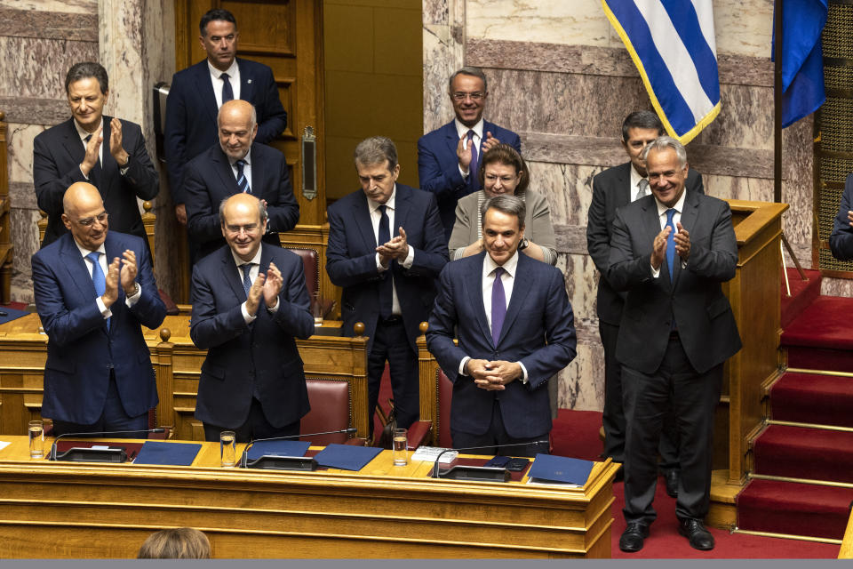 Greece's Prime Minister Kyriakos Mitsotakis acknowledges an applause during a parliament session in Athens, Greece, Saturday, July 8, 2023. The newly elected Greek government won a vote of confidence from the parliament, following a three-day debate. (AP Photo/Yorgos Karahalis)