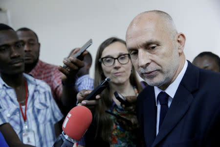 Oxfam International Regional Director for Latin America, Simon Ticehurst, and Oxfam Intermon Executive Affiliate Unit head, Margalida Massot, speak with journalists after a meeting with Haiti's Minister of Planning and External Cooperation Aviol Fleurant in Port-au-Prince, Haiti, February 22, 2018. REUTERS/Andres Martinez Casares