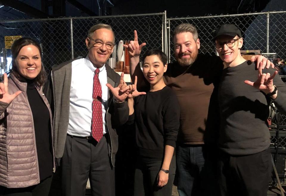 Spencer Lott, far right, on the set of “A Beautiful Day in the Neighborhood” with Tom Hanks and others. Spencer Lott Puppeteers