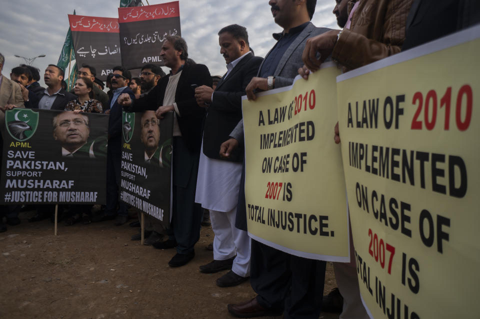 Supporters of former Pakistani military ruler Gen. Pervez Musharraf protest a court's decision, in Islamabad, Pakistan, Wednesday, Dec. 18, 2019. The Pakistani court sentenced Musharraf to death in a treason case related to the state of emergency he imposed in 2007 while in power, officials said. Musharraf who is apparently sick and receiving treatment in Dubai where he lives was not present in the courtroom. (AP Photo/B.K. Bangash)