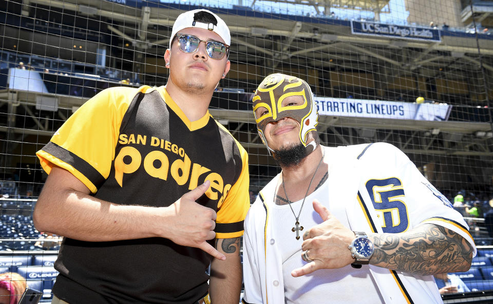 Rey Mysterio and son Dominik Gutierrez at a game between the San Diego Padres and the Washington Nationals on June 19, 2016 in San Diego, CA. (Andy Hayt / Getty Images)