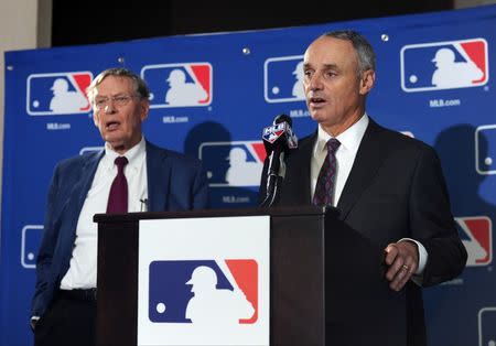 Aug 14, 2014; Baltimore, MD, USA; Newly elected commissioner of baseball Rob Manfred speaks at a press conference after being elected by team owners to be the next commissioner of Major League Baseball. At left is MLB commissioner Bud Selig. Mandatory Credit: H.Darr Beiser-USA TODAY Sports