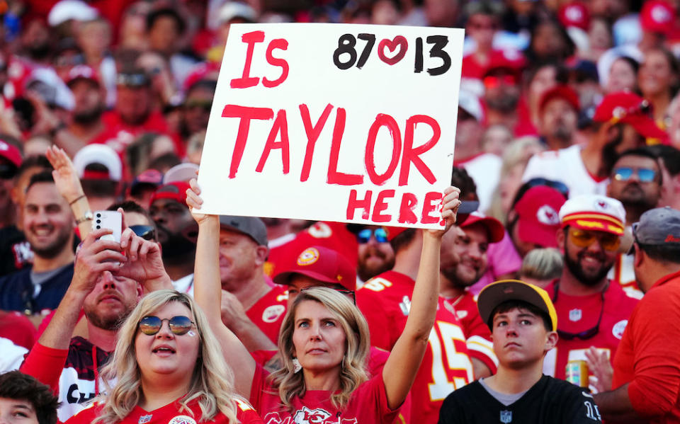 KANSAS CITY, MISSOURI - SEPTEMBER 24: A fan Taylor swift holds u a sign during a game between the Chicago Bears and the Kansas City Chiefs at GEHA Field at Arrowhead Stadium on September 24, 2023 in Kansas City, Missouri. (Photo by Jason Hanna/Getty Images)