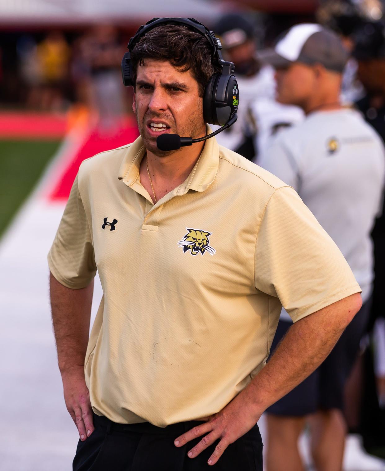 Buchholz Bobcats head coach Chuck Bell coaches from the sidelines. The Bradford Tornadoes hosted the Buchholz Bobcats at Bradford High School in Starke, FL on Thursday, May 25, 2023. [Doug Engle/Gainesville Sun]