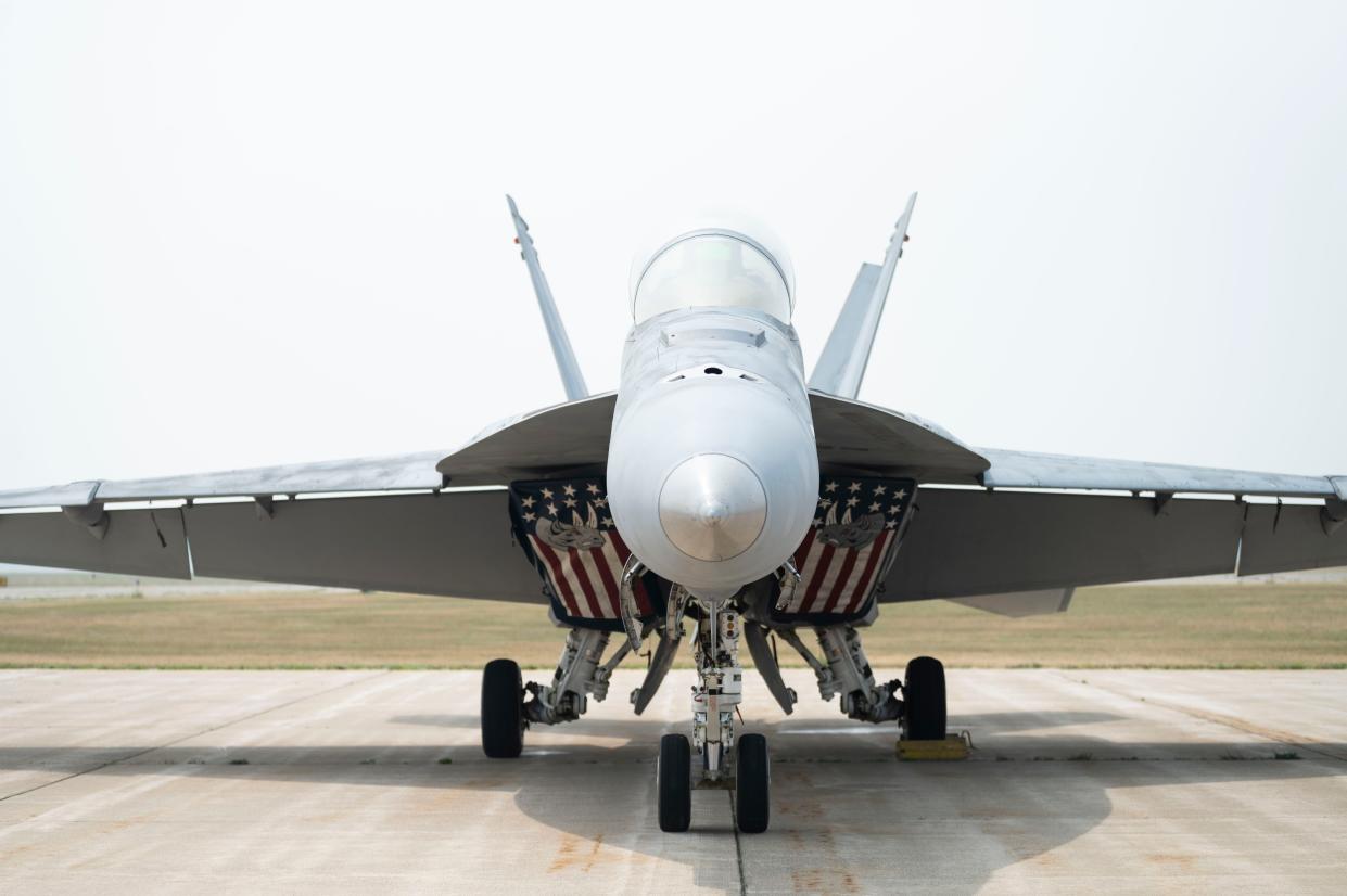 An F-18 Super Hornet aircraft arrives in preparation for the Field of Flight air show at Western Michigan University College of Aviation in Battle Creek on Thursday, June 29, 2023.