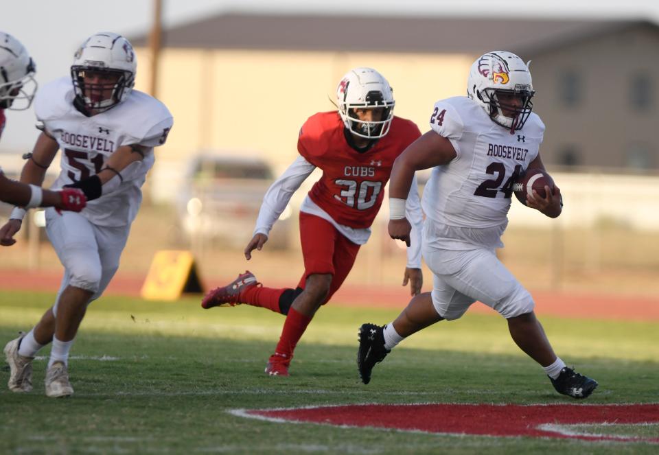 Roosevelt's Angel Olivares, right, runs with the ball against Brownfield in a non-district football game, Friday, Sept. 8, 2023, at Cub Stadium in Brownfield.