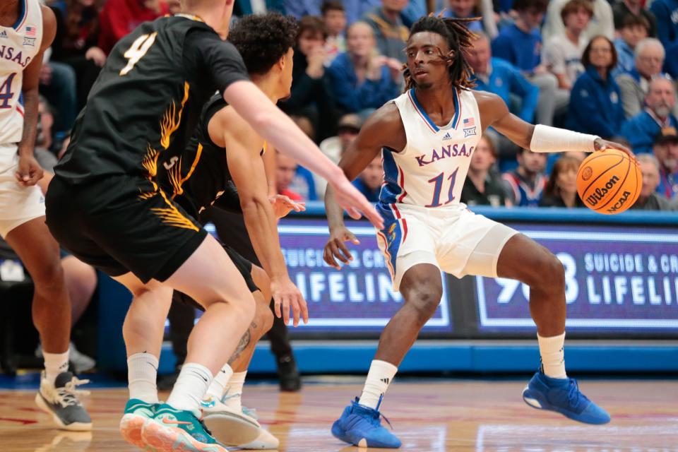 Kansas freshman guard Jamari McDowell (11) steps back against Fort Hays State during the first half of Wednesday's exhibition game inside Allen Fieldhouse.