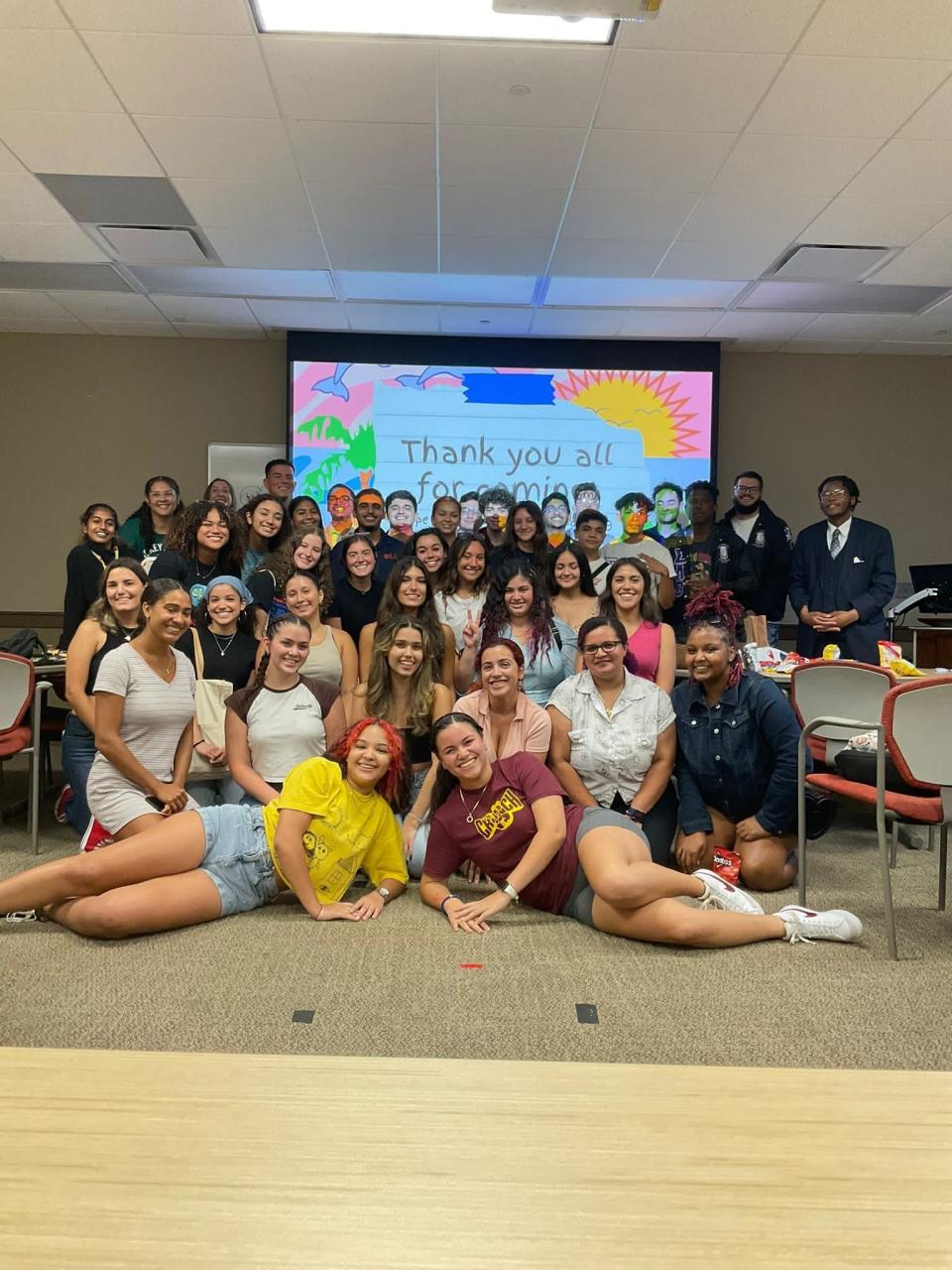 Students of the Puerto Rican Student Association pose for a picture on Florida State University's campus during an event.