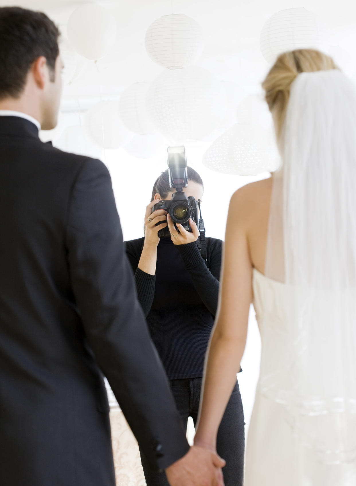 A wedding photographer sued a couple who defamed her on social media — and won a hefty sum. (Photo: Getty Images)