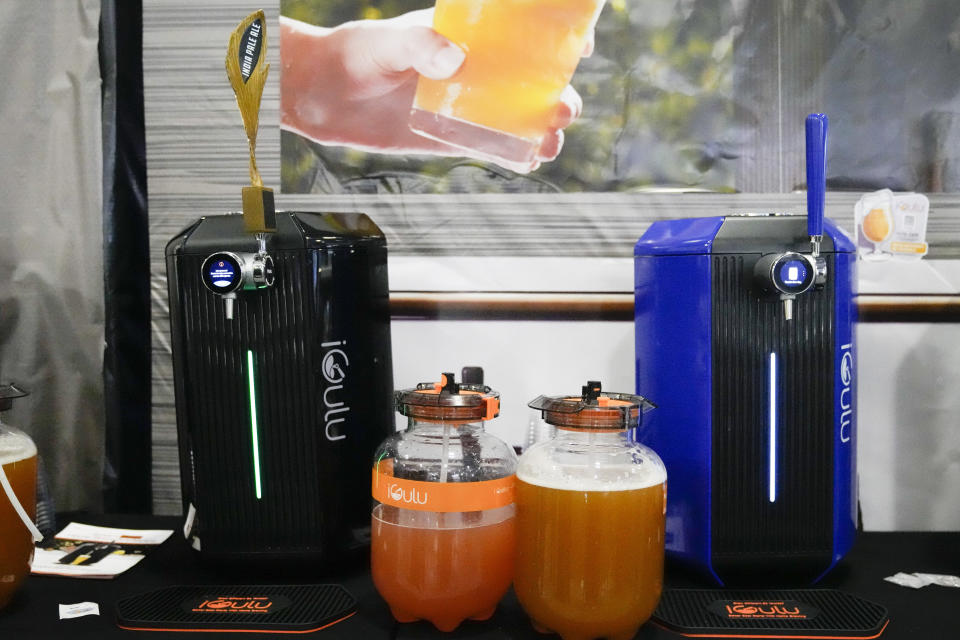 The IGulu F1 automated home brewing machines are displayed during the CES tech show Wednesday, Jan. 10, 2024, in Las Vegas. (AP Photo/Ryan Sun)