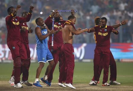 Cricket - England v West Indies - World Twenty20 cricket tournament final - Kolkata, India - 03/04/2016. West Indies players celebrate after winning the final. REUTERS/Adnan Abidi