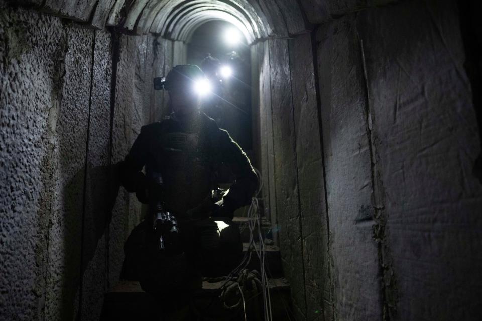 Israeli soldiers show journalists an underground tunnel where the Israeli military said it had found evidence hostages were held by militants in Khan Younis, Gaza Strip, on Wednesday, Jan. 10. 2024.