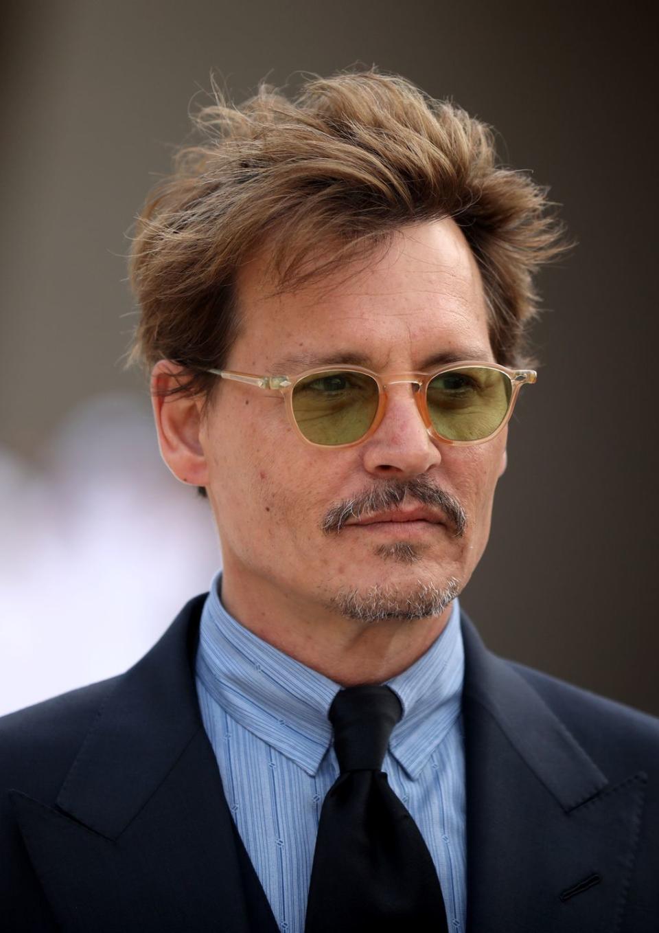 <p>Johnny Depp's life has taken a darker turn in recent years: He was <a href="https://www.buzzfeednews.com/article/amberjamieson/amber-heard-johnny-depp-abuse-allegations" rel="nofollow noopener" target="_blank" data-ylk="slk:accused;elm:context_link;itc:0;sec:content-canvas" class="link ">accused</a> of domestic abuse by his ex-wife Amber Heard, and he <a href="https://deadline.com/2018/06/johnny-depp-rolling-stone-650m-film-fortune-almost-all-gone-report-1202415197/" rel="nofollow noopener" target="_blank" data-ylk="slk:reportedly;elm:context_link;itc:0;sec:content-canvas" class="link ">reportedly</a> lost his fortune. </p>