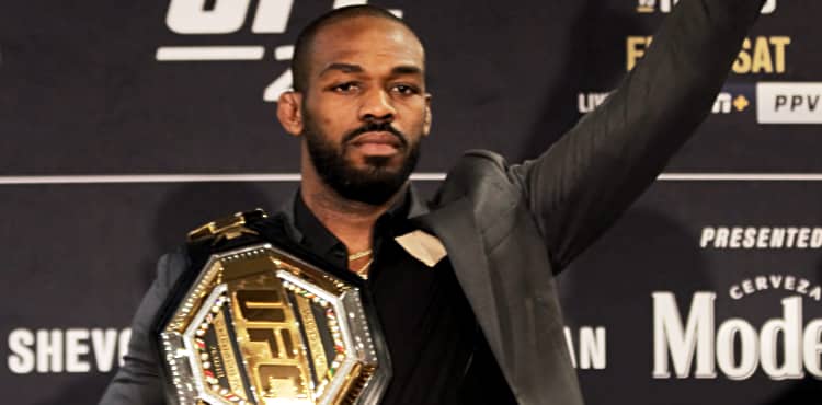 Jon Jones UFC 247 arm raised with belt