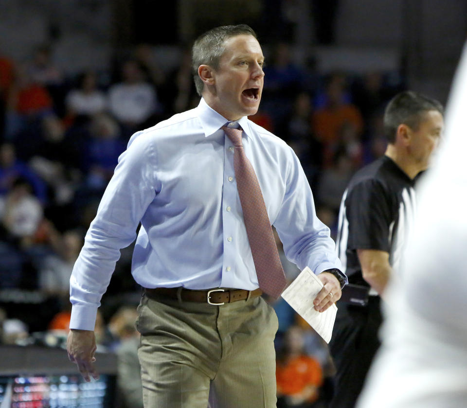 Florida coach Mike White yells to his players during an NCAA college basketball game against Mississippi on Tuesday, Jan. 14, 2020, in Gainesville, Fla. (Brad McClenny/The Gainesville Sun via AP)