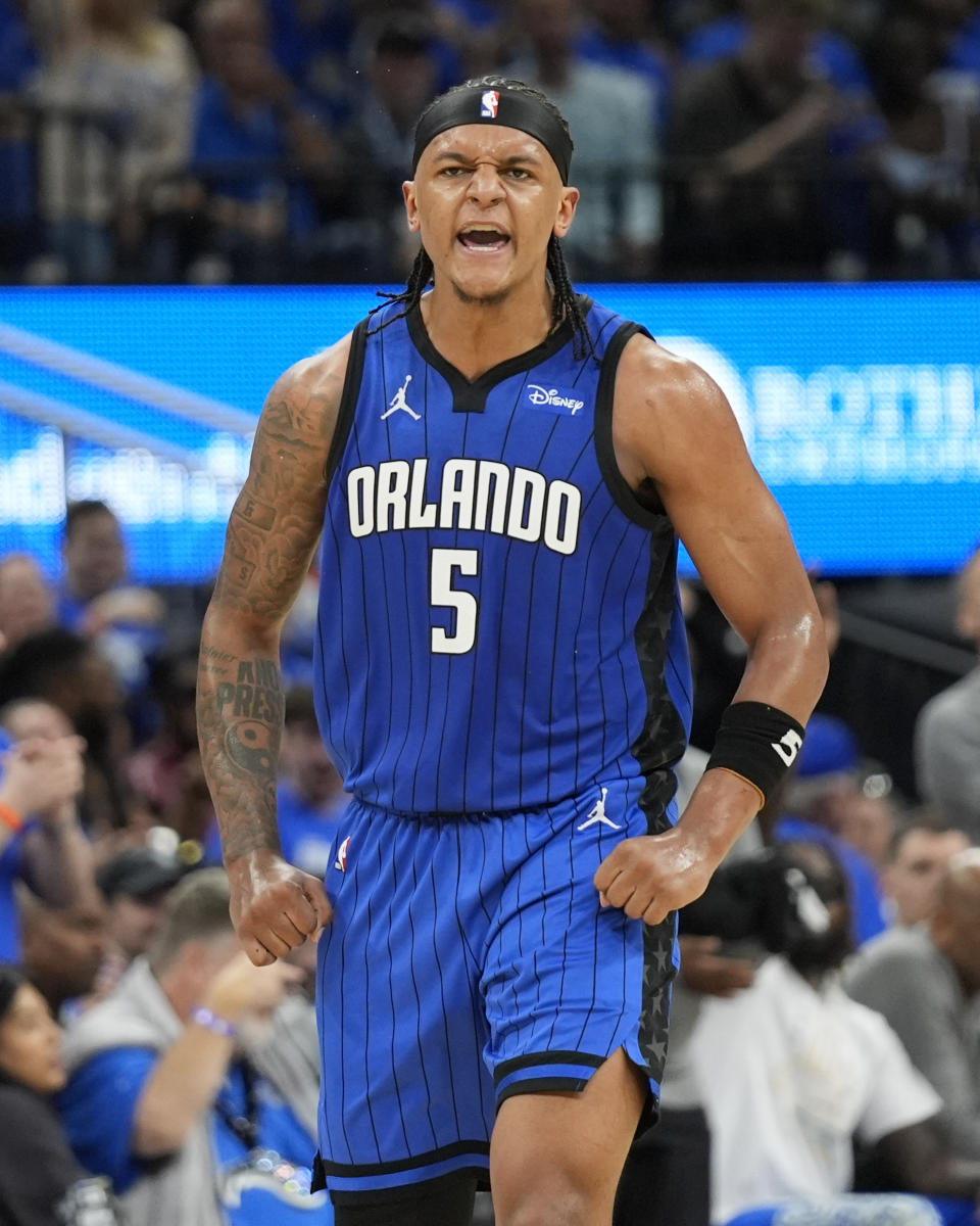 Orlando Magic forward Paolo Banchero (5) celebrates after making a 3-point shot against the Cleveland Cavaliers during the first half of Game 3 of an NBA basketball first-round playoff series Thursday, April 25, 2024, in Orlando, Fla. (AP Photo/John Raoux)