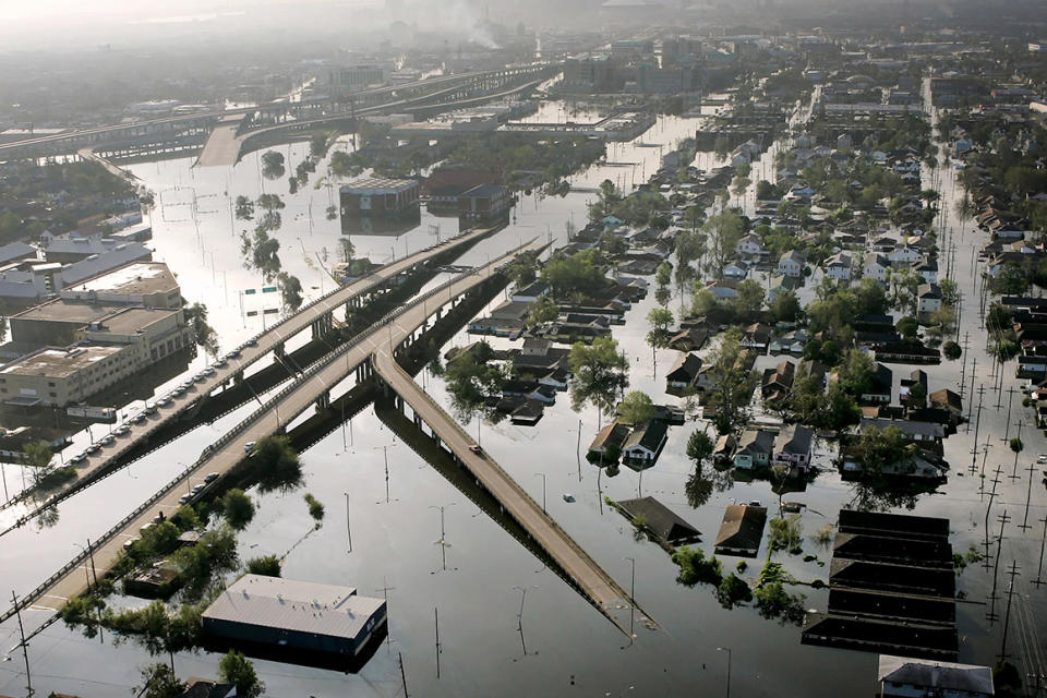 In this Aug. 30, 2005 photo, floodwaters from Hurricane Katrina fill the streets near downtown New Orleans. 