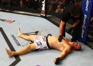 ATLANTA, GA - APRIL 21: Chad Griggs lays on the mat after tapping out during his heavyweight bout against Travis Browne for UFC 145 at Philips Arena on April 21, 2012 in Atlanta, Georgia.