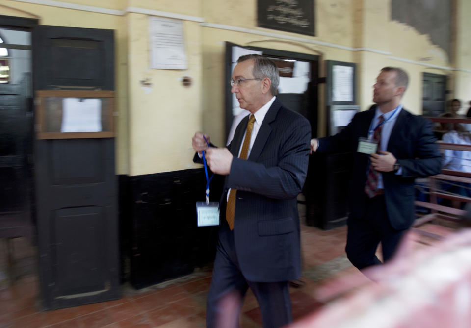 Scot Marciel, U.S. Ambassador to Myanmar, arrives at the court for the trial of two Reuters journalists Monday, Sept. 3, 2018, in Yangon, Myanmar. The court sentenced two Reuters journalists to seven years in prison Monday for illegal possession of official documents, a ruling that comes as international criticism mounts over the military's alleged human rights abuses against Rohingya Muslims. (AP Photo/Thein Zaw)