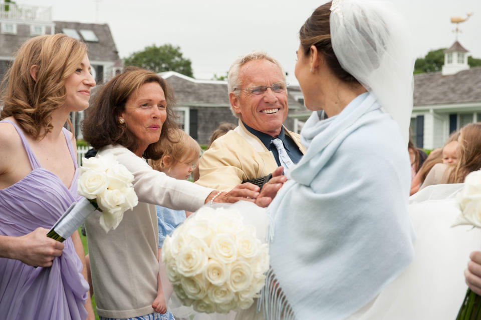 <p>From left: Kerry Townsend, Beth Kennedy, Joseph P. Kennedy Jr., the bride and baby David Kennedy Birdzell in the background</p>