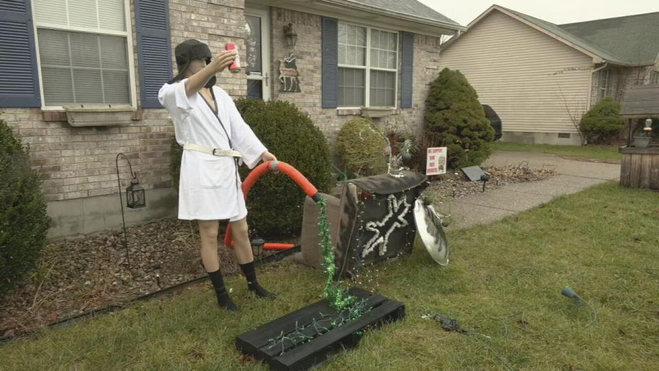 A 'Cousin Eddie' Christmas display is shown in the Dogwood subdivision of Shepherdsville, Ky. on Wednesday, Dec. 21, 2022. The display looked a little too real and police were called to check it out. Officers arrived to find a mannequin decorated like the character from “National Lampoon's Christmas Vacation." Homeowner Joni Keeney said she decided to put up the display from her favorite Christmas movie to have some fun.(WDRB via AP)