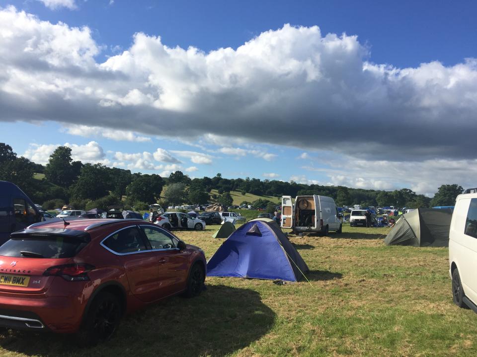 We were greeted with blue skies and rows of tents and cars