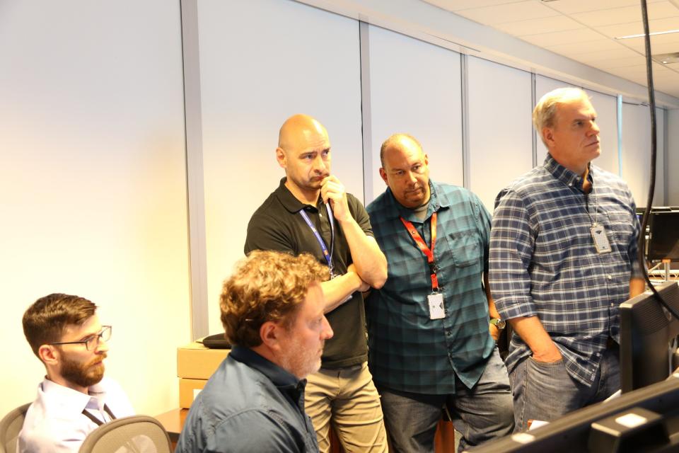 DSS Deputy Assistant Director Thad Osterhout (far right) and other DSS leadership, alongside interagency partners, closely monitored the departure from Khartoum from the DSS Command Center in Arlington, VA on April 22, 2023