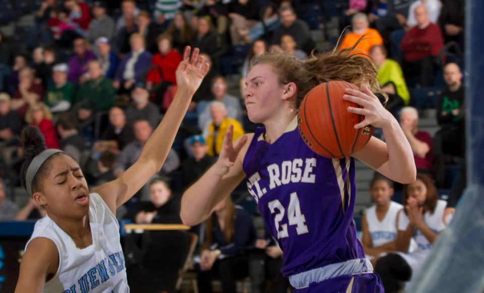 Immaculate's Jordan McLemore goes down as she tries to keep up with St. Rose's Kat Phipps as she drives to the basket. Immaculate's St Rose vs Lodi Immaculate NJSIAA State Girls Basketball Non-Public B Group Championshp on March 14, 2015 in Toms River. Peter Ackerman/Staff Photographer