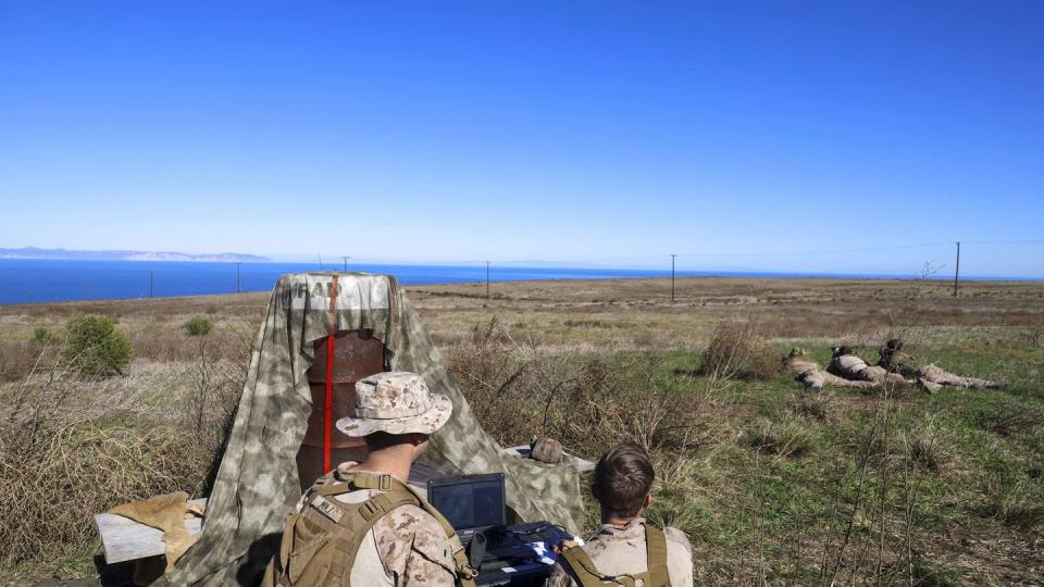 U.S. Marines monitor the horizon in search of notional targets by using binoculars and employing a radar system at an expeditionary advanced base on San Clemente Island, Calif., on Jan. 10, 2024. (Gunnery Sgt. Antonio Campbell/U.S. Marine Corps)