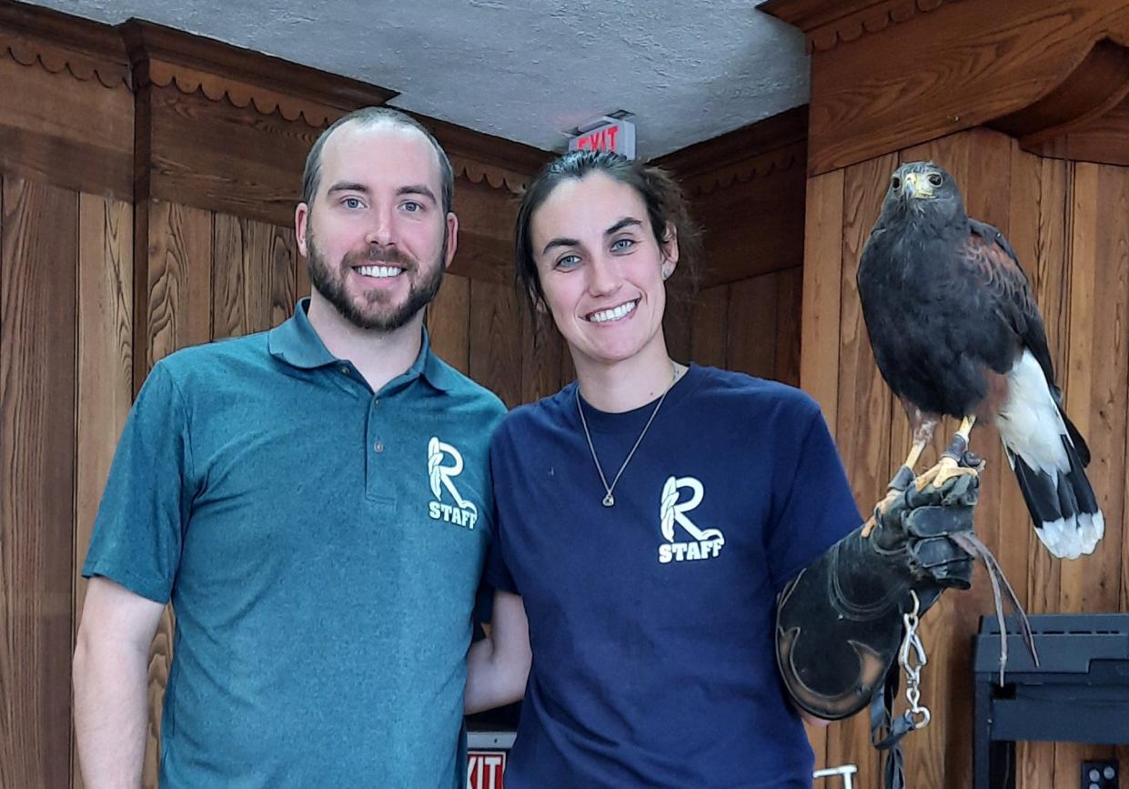 Josh Kuszmaul, executive director of Raptor Hollow Sacturary, and Katelyn Vannoy, the facility's veterinarian, met recently with Rotary Club of Alliance to detail the Washington Township operation.