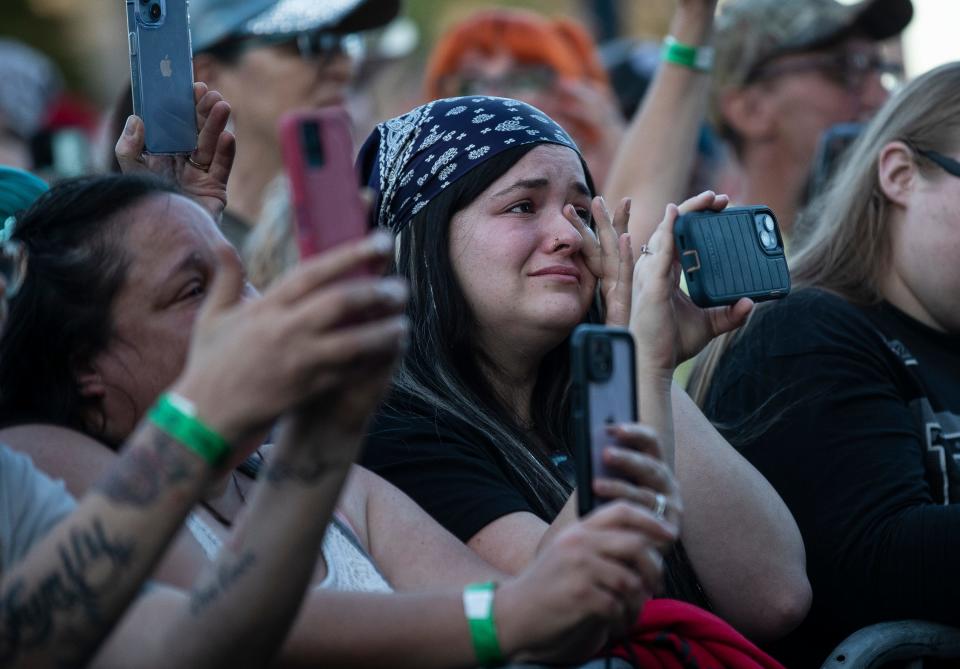 Fans cheer as Jelly Roll performs during a live listening party at Greenhouse of Walled Lake in Walled Lake on Friday, May 26, 2023.