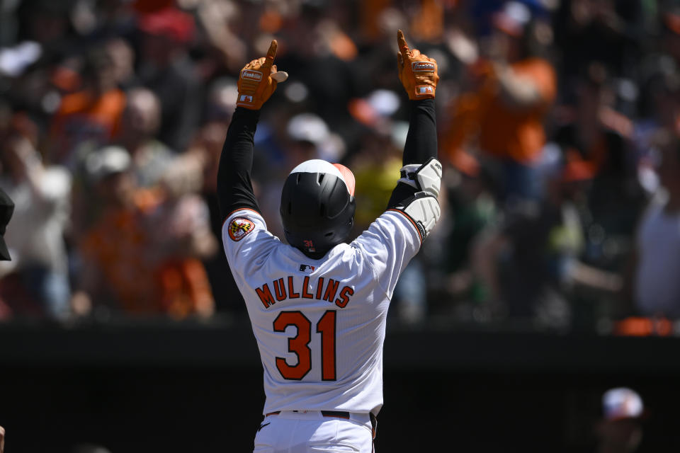 Baltimore Orioles' Cedric Mullins celebrates after his home run during the second inning of a baseball game against the Milwaukee Brewers, Sunday, April 14, 2024, in Baltimore. (AP Photo/Nick Wass)