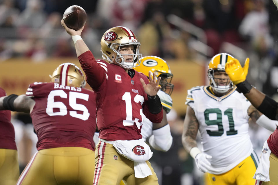 San Francisco 49ers quarterback Brock Purdy (13) throws a pass during the second half of an NFL football NFC divisional playoff game against the Green Bay Packers, Saturday, Jan. 20, 2024, in Santa Clara, Calif. (AP Photo/Ashley Landis)
