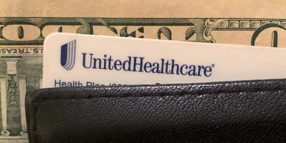 A UnitedHealth Group health insurance card is seen in a wallet in this picture illustration October 14, 2019. REUTERS/Lucy Nicholson/Illustration