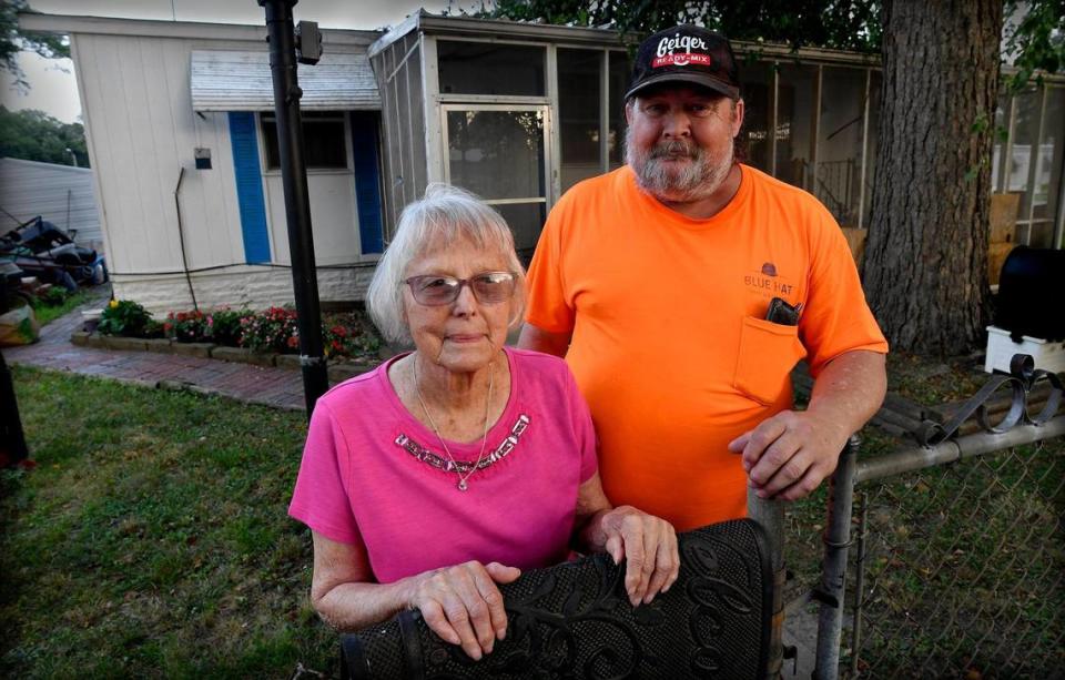 Joy Ufford, left, has lived at the Heart Village mobile home park for 51 years. She and her son, Gregg, say their trailer is too old to qualify for being moved.