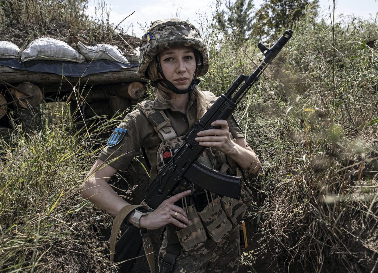 A Ukrainian solider is seen in Donetsk, Ukraine, on Aug. 15, 2022. <a href="https://media.gettyimages.com/photos/ukrainian-women-soldier-28yearold-svetlana-who-served-as-a-captain-in-picture-id1242536497" rel="nofollow noopener" target="_blank" data-ylk="slk:Metin Aktas/Andalou Agency via Getty Images;elm:context_link;itc:0;sec:content-canvas" class="link ">Metin Aktas/Andalou Agency via Getty Images </a>