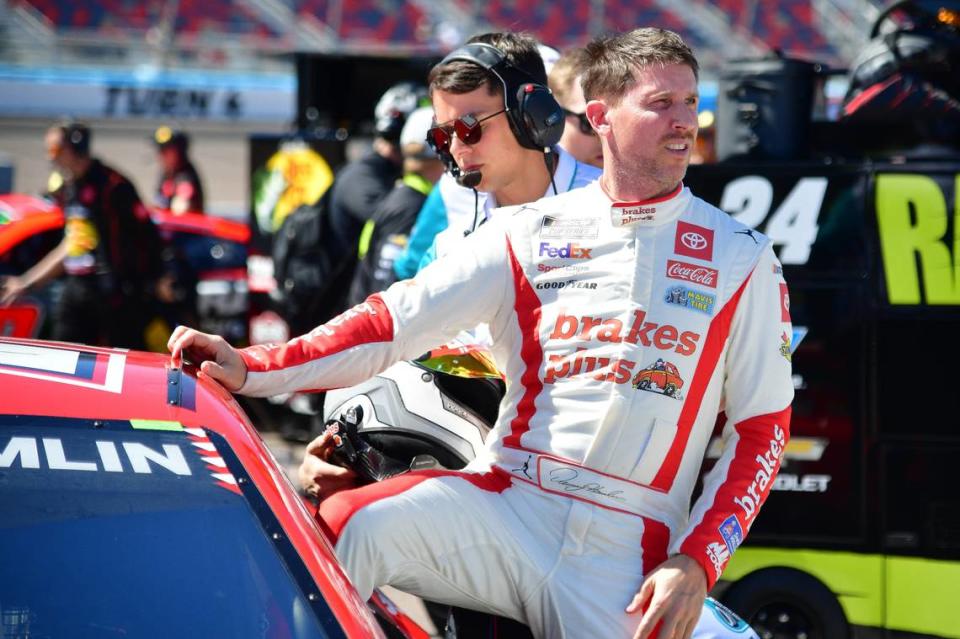 Denny Hamlin climbs into his No. 11 Joe Gibbs Racing Toyota Camry during this week’s NASCAR Cup Series qualifying at Phoenix Raceway in Avondale, Ariz.